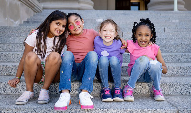 girls sitting together