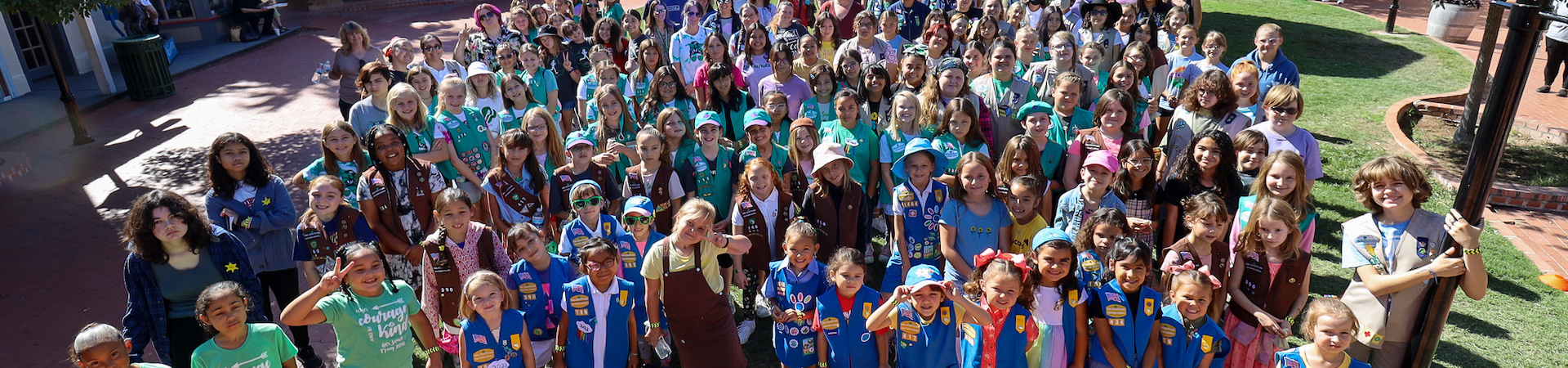  group photo of girl scouts from southern arizona at a council bridging event 