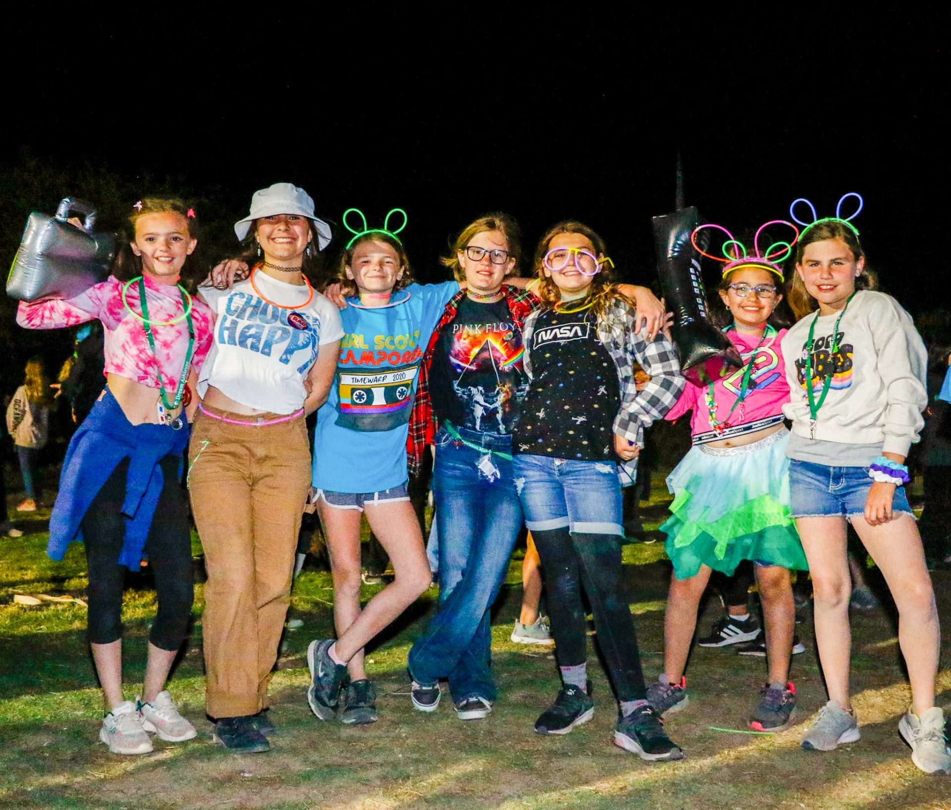 group of girl scouts dressed in neon for camporee