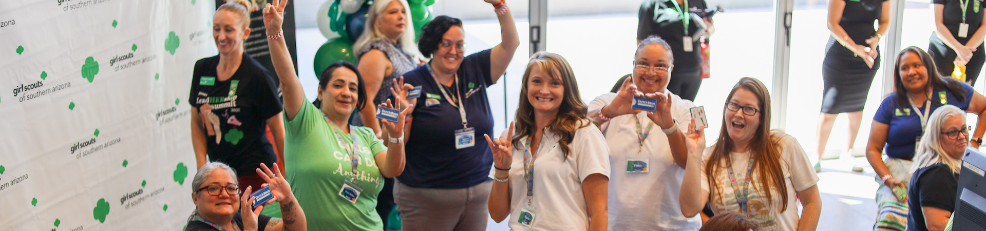  adult woman girl scout volunteer outdoors smiling 