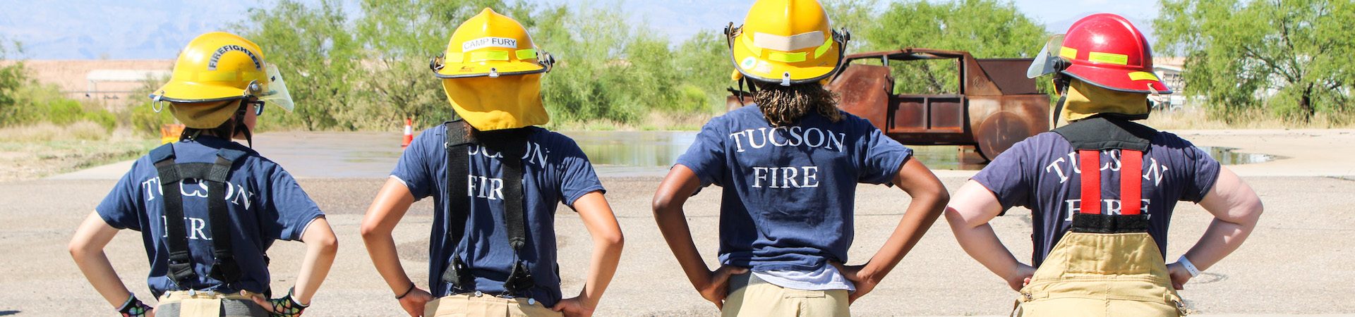  camp fury participants in fire fighter garb 