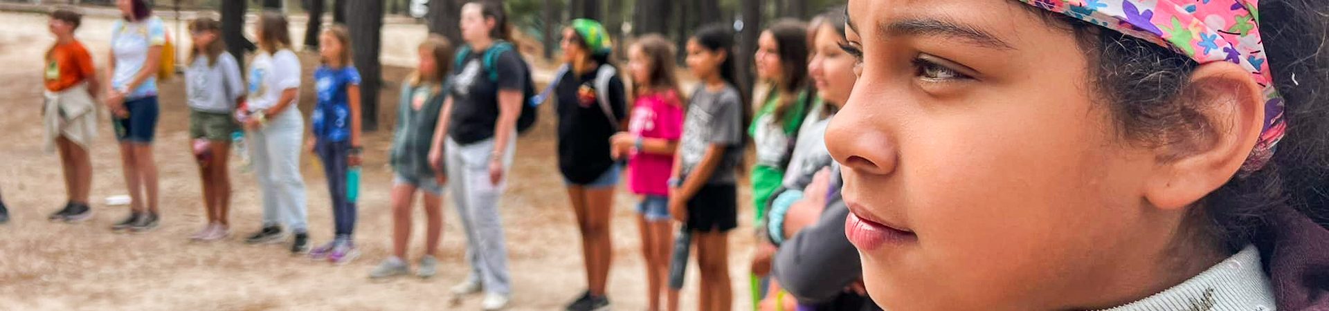  profile of girl scout camper in a group 