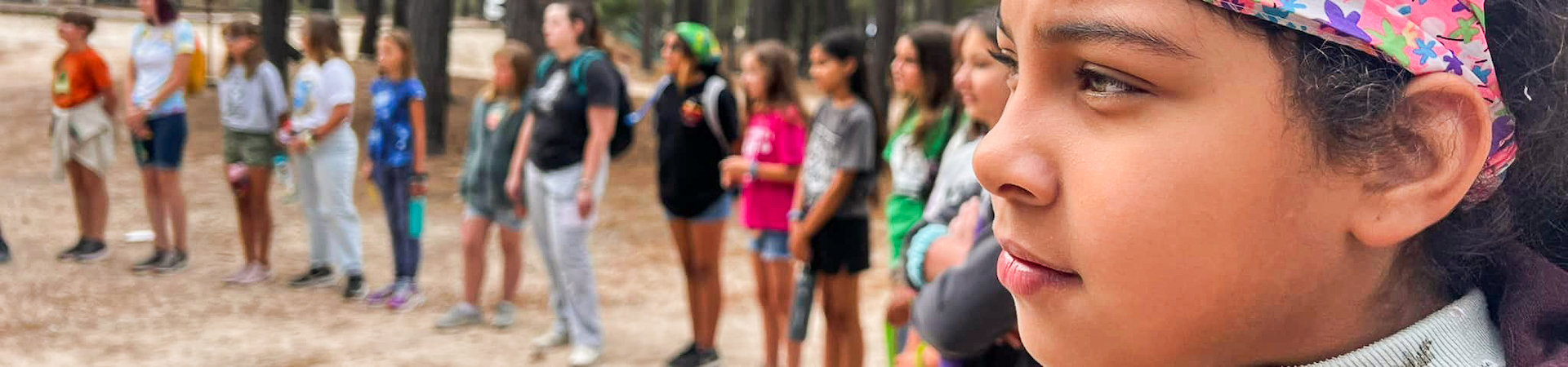  profile of girl scout camper in a group 