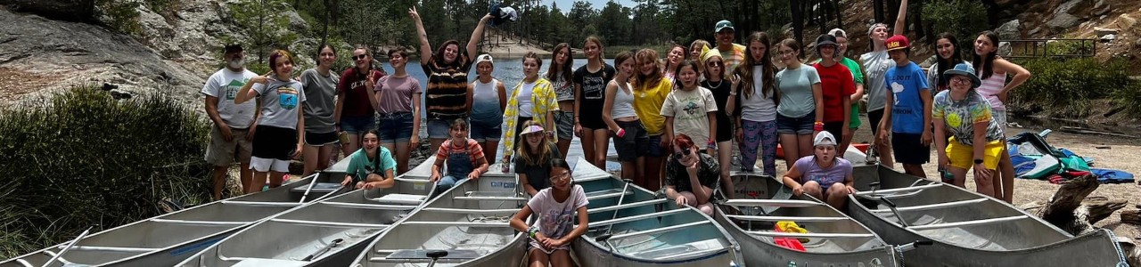 girl scouts watching a butterfly