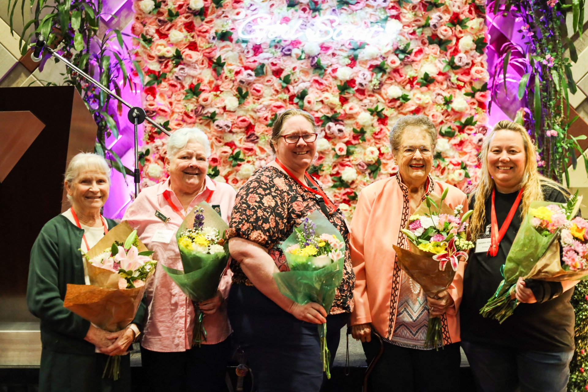 long time volunteers pose at volunteer recognition event