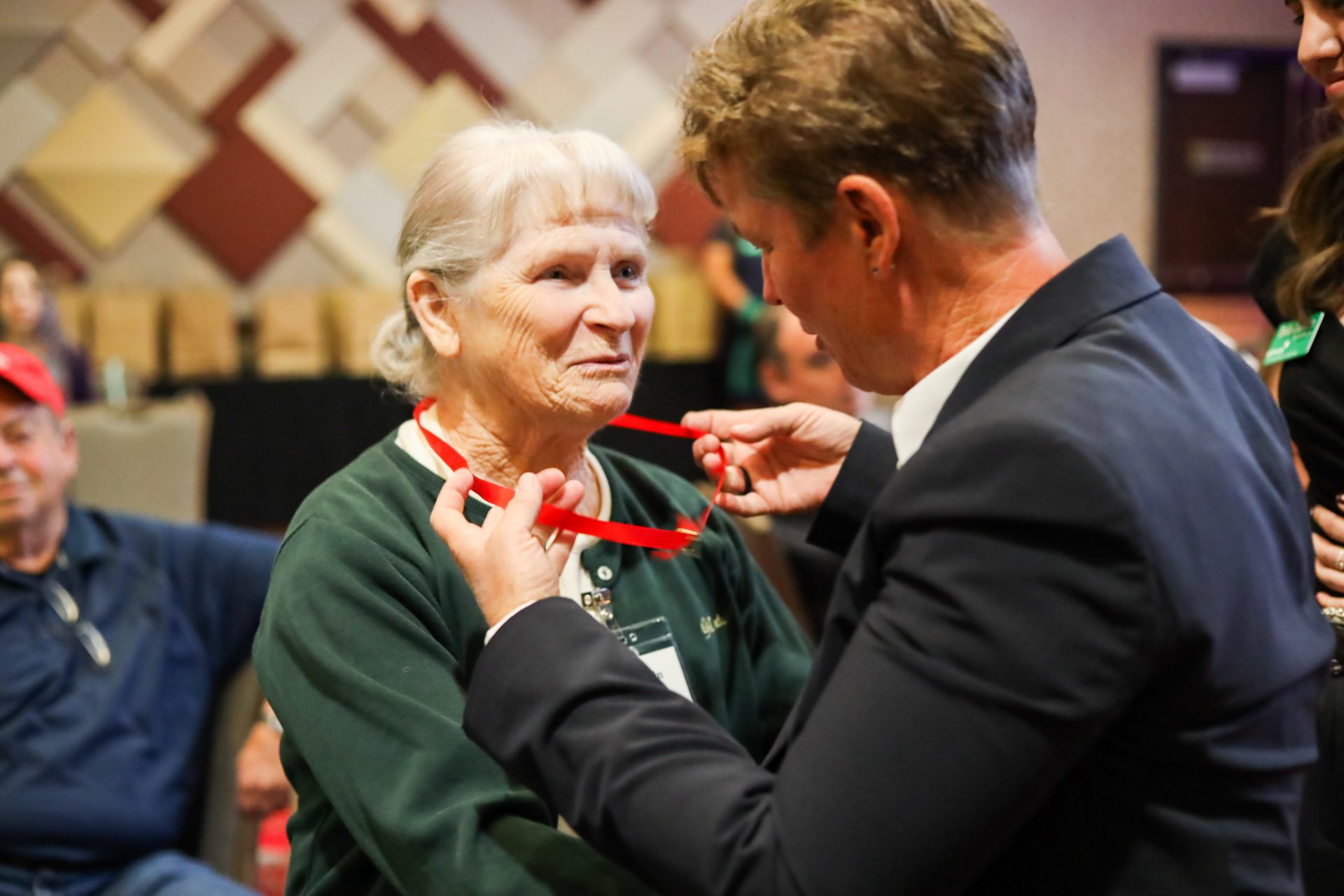 long time volunteer receives recognition at events ceremony