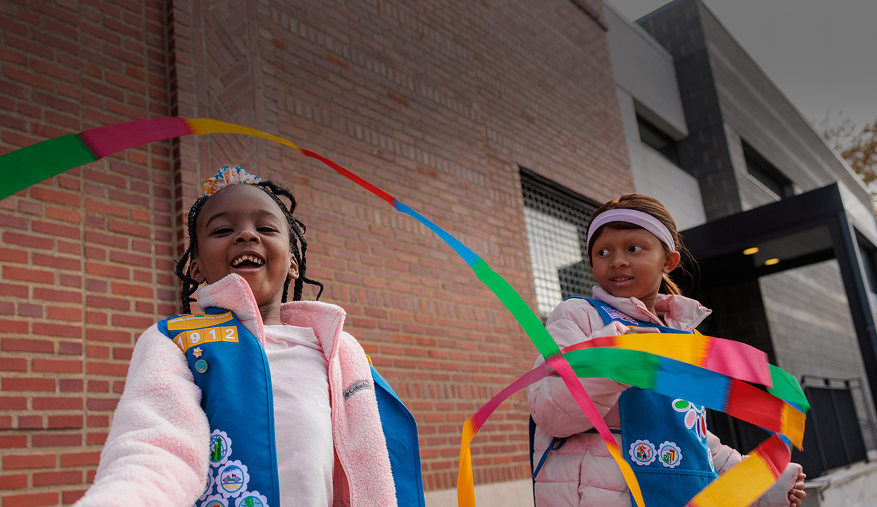 Two girls playing with streamers