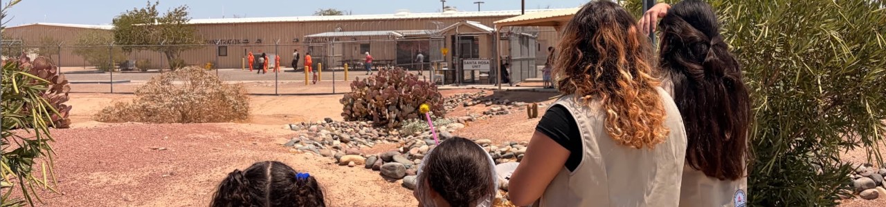 girl scouts looking on at detention unit in arizona
